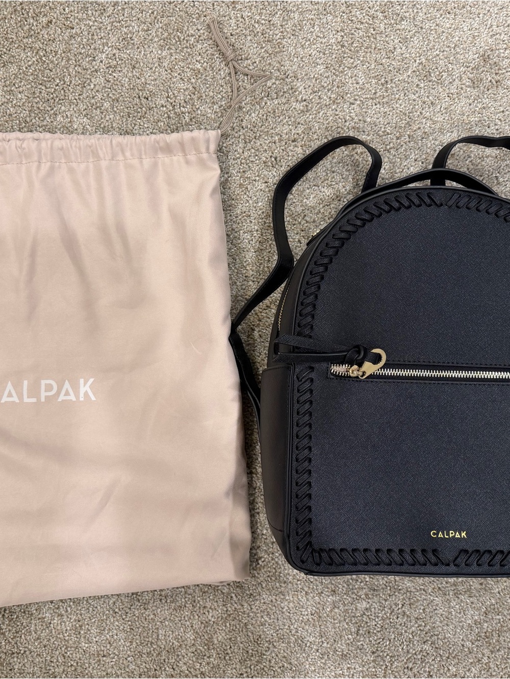 Calpak Black Mini Backpack with Whipstitch Trim and Gold Hardware